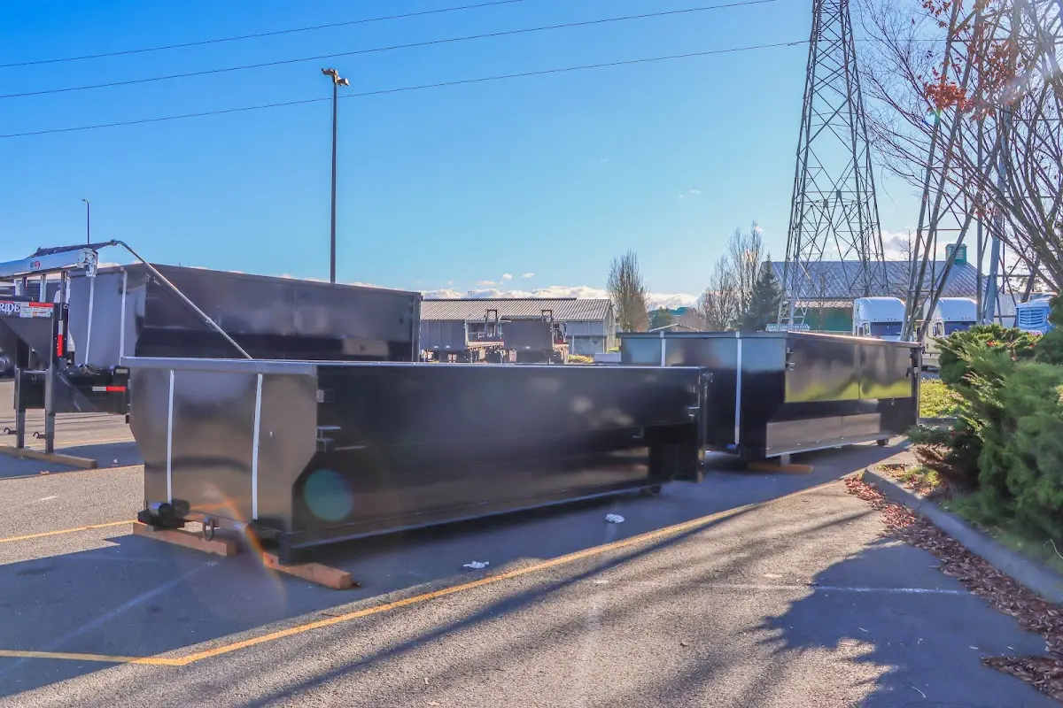 Roll-off dumpster ready for waste disposal at job site for 3 Yard Dumpster Rental in East Orange